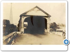 Covered bridge over the Rancocas around 1923.  Radio tower in background