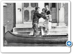 Mount Holly - Allen Compton rescuing Mrs. Dorothy Brown and her daughter May, 9, from their flooded home on Mill Street - September 3rd 1938 - As the spreading floodwaters of the Rancocas Creek, both here and in other communities forced many families to flee to the safety of higher ground