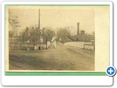 Smithville - Street scene, bridge and factory around 1908