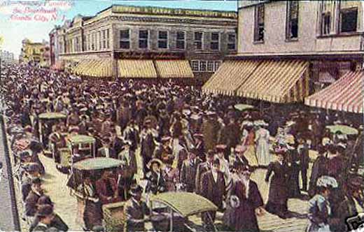 Atlantic City - Boardwalk with parade with rolling chairs